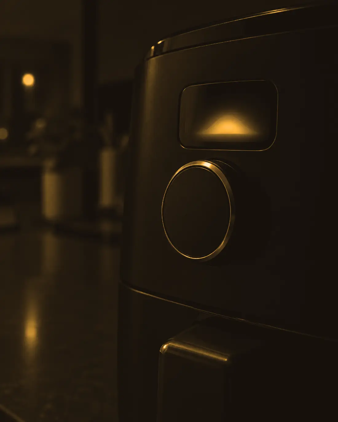 Een draaiknop en een oplichtend display in een donkere keuken (AI-beeld, geen echt product)